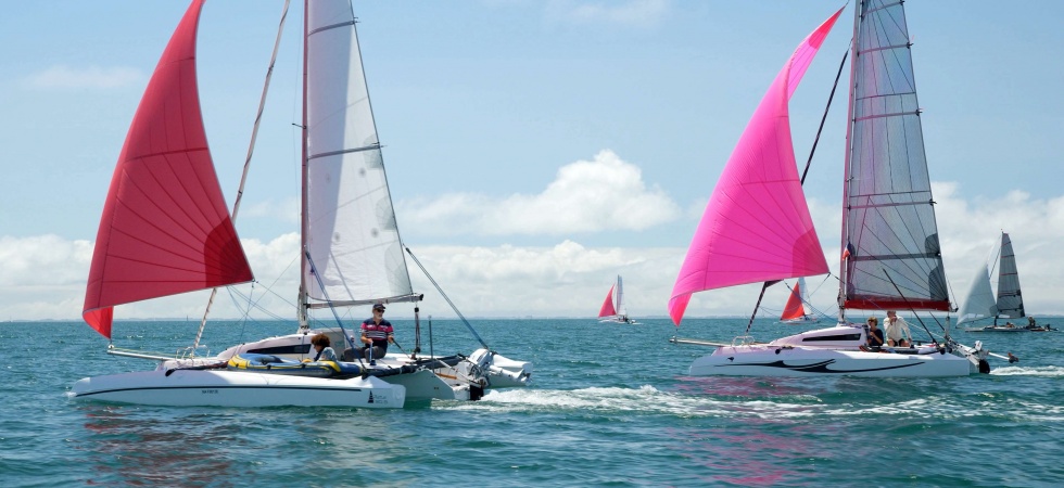 Astus trimarans sailing together
